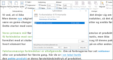 Word-dokument med dialogboksen Påmindelse oven på det.