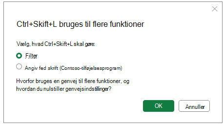 Skærmbillede af dialogboksen til tastaturgenvejskonflikt, der viser mulige handlinger.