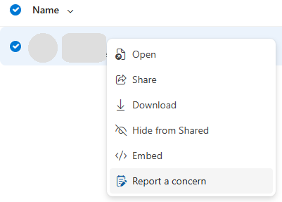 Skærmbillede af, hvordan du rapporterer misbrug i OneDrive