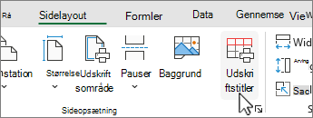 Klik på Udskriftstitler på fanen Sidelayout.