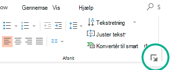 Åbn dialogboksen Afsnit ved at klikke på pilen i nederste højre hjørne af gruppen Afsnit under fanen Hjem på båndet.