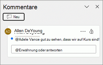 Neben einem Kommentarbereich wird ein blauer Punkt angezeigt.