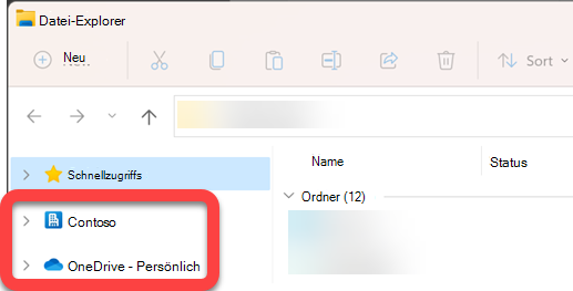 Im Navigationsbereich auf der linken Seite von Explorer befinden sich Ordner der obersten Ebene für eine synchronisierte SharePoint-Bibliothek und ein synchronisiertes OneDrive.