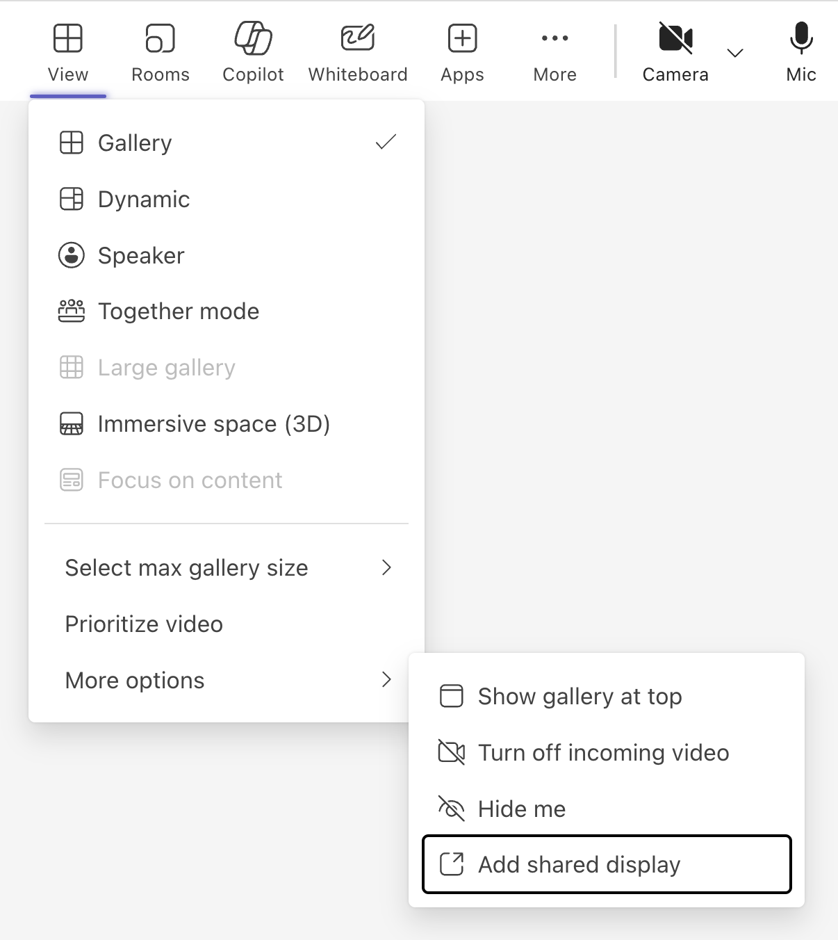 The view switcher, denoted by the View button in the Teams meeting menu bar, contains an option to add a shared display mode under the More Options sub menu.