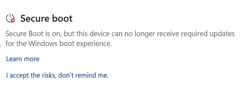 The Secure Boot section showing the Requires action status with a red stop icon.