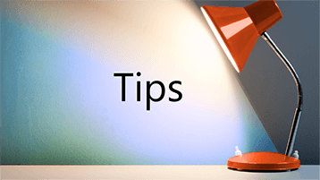 A light shining on the word Tips
