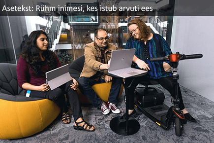 Arvuti ees istuv rühm inimesi