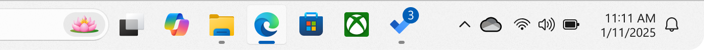 Capture d’écran de la barre des tâches Windows avec une application montrant un badge.