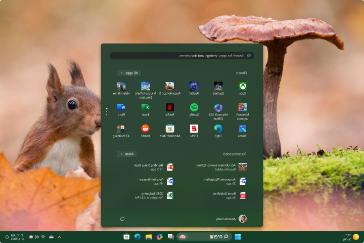 צילום מסך של שולחן העבודה של Windows עם צבע רקע שהוחל על 'התחל גברי' ושורת המשימות.