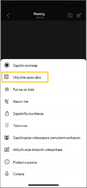 Gumb za uključivanje opisa uživo