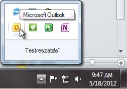 Notification area expanded to show the Outlook icon