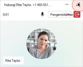 Antarmuka panggilan yang menampilkan kontrol matikan suara, pengamblihan, dan akhiri panggilan.