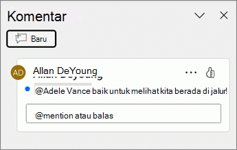 Titik biru muncul di samping bagian komentar di panel Komentar.