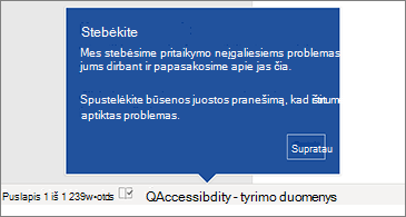 Būsenos juosta, kurioje rodoma, kad veikia pritaikymo neįgaliesiems tikrintuvas
