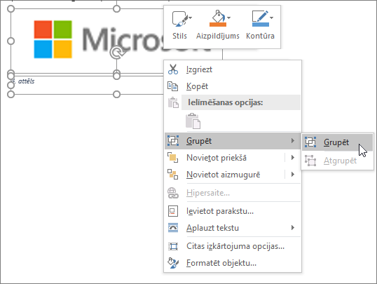 Grupējiet attēlu un parakstu, lai tos pārvietotu kopā.