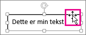 Markør på en kantlinje for en tekstboks endret til en firehodet pil