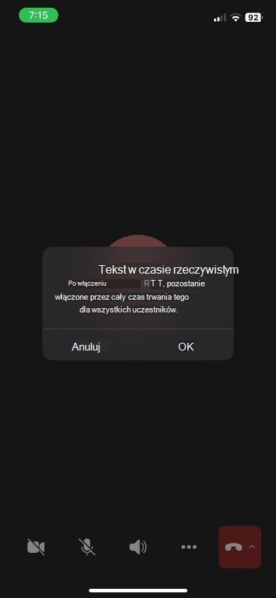 Okno spotkania w aplikacji Teams z panelem RTT u dołu urządzenia z systemem iOS.