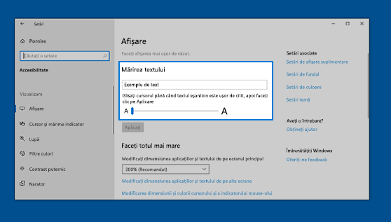Pentru a mări totul, inclusiv imaginile și aplicațiile, alegeți o opțiune din meniul drop-down de sub Măriți totul.