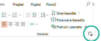 Odprite pogovorno okno Odstavek, tako da kliknete puščico v spodnjem desnem kotu skupine Odstavek na zavihku Osnovno na traku.