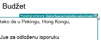 Snimak ekrana koji prikazuje obaveštavanje o reviziji isticanjem o tome ko je izvršio promenu i kada je izvršena