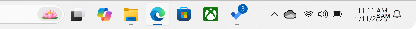 Snimak ekrana Windows trake zadataka sa aplikacijom na kojoj se vidi bedž.