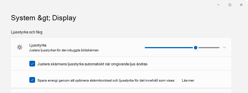 skärmbild av Inställningar som visar inställning av ljusstyrkan.