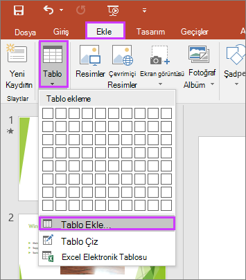 PowerPoint şeridindeki Ekle sekmesinde Tablo seçeneğini gösterir