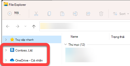 Trong ngăn dẫn hướng ở bên trái của File Explorer, có các thư mục mức cao nhất cho thư viện SharePoint đã đồng bộ và OneDrive đã đồng bộ.