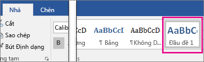 Đầu đề 1 được tô sáng trên tab Nhà.