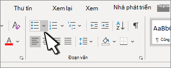 Mũi tên xuống dấu đầu dòng được tô sáng trong nhóm Đoạn văn.