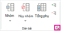 Trong nhóm Đại cương, bấm công cụ khởi động hộp thoại.